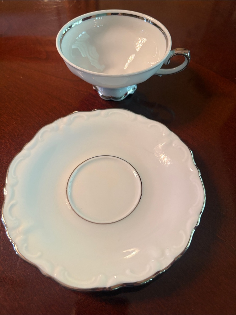 Estate Symphony White Porcelain Tea Cup and Saucer with Silver Trim - Picture 2 of 3